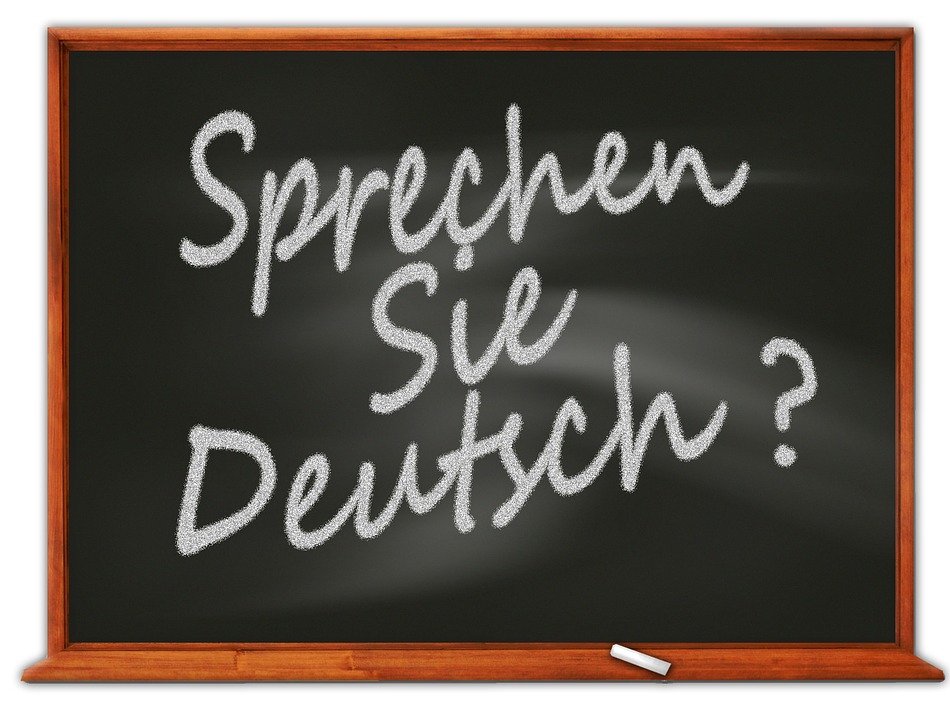 Черна дъска с надпис с тебешир Sprechen Sie Deutsch?